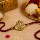 Graceful Dolphin Motif Golden Rakhi
